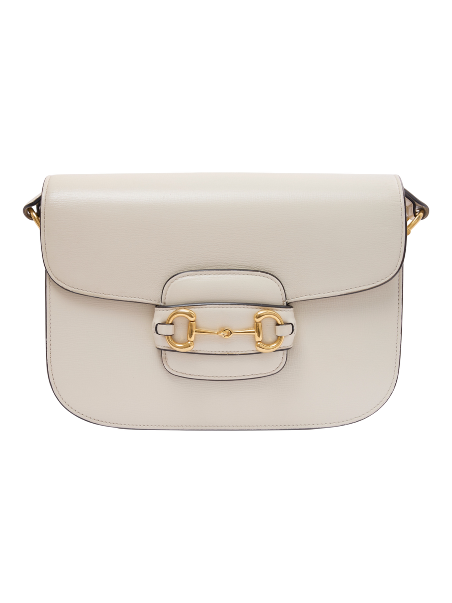 Hera Collective Gucci Horsebit 1955 shoulder bag in white smooth calfskin leather with gold-tone horsebit hardware.