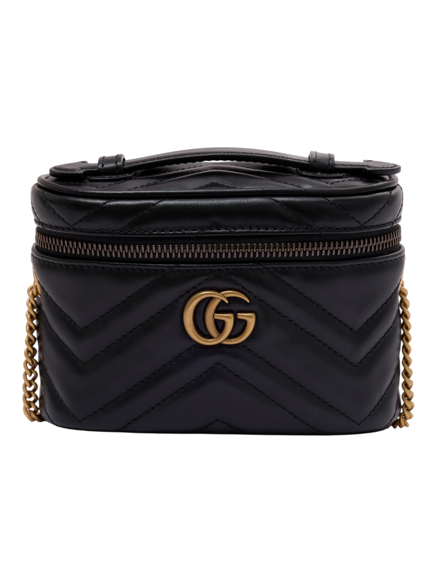 Hera Collective Gucci GG Marmont mini vanity bag in black quilted leather with gold-toned chain strap and GG logo.