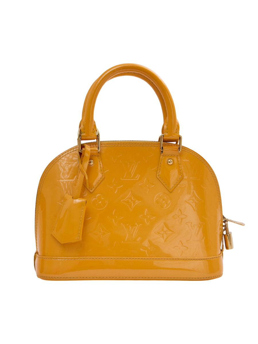 Hera Collective Louis Vuitton Alma BB in Jaune Passion yellow monogram embossed Vernis patent leather with brass trim